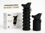 Black Pee Sport bottle with packaging on a white background